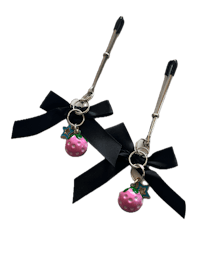 two black bows with black ribbons on them